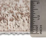 Carpet pile height measured with a ruler