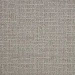 Close-up of beige patterned loop carpet texture