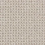 Close-up of grey and white textured carpet loops