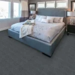 Dark grey patterned carpet in a modern bedroom