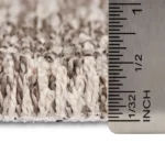 Measuring carpet pile height with a metal ruler