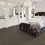 Modern bedroom with dark brown textured carpet