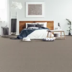 Modern bedroom with tan patterned carpeting